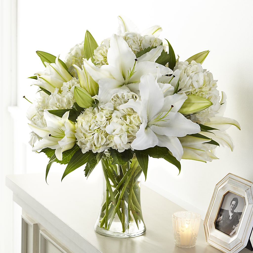 lily of the valley flower arrangement Compassionate Lily Bouquet – white flower arrangement | Moreno Valley, CA
